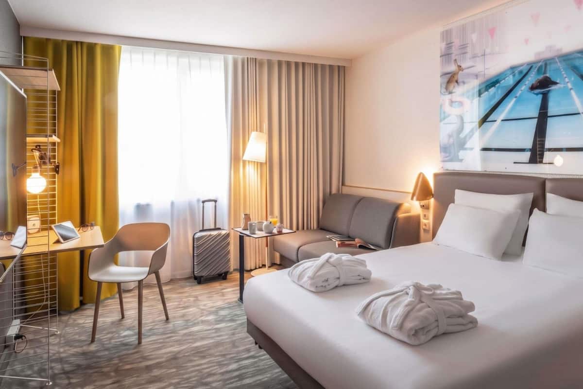 Premium bedding, desk, blackout curtains, soundproofing