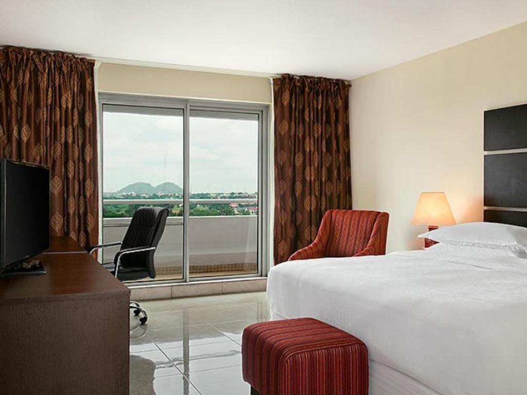 Premium bedding, down comforters, pillowtop beds, minibar