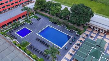 Outdoor pool, pool umbrellas, pool loungers