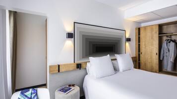 Literie de qualité supérieure, coffres-forts dans les chambres, bureau