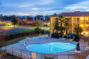 Seasonal outdoor pool, pool loungers