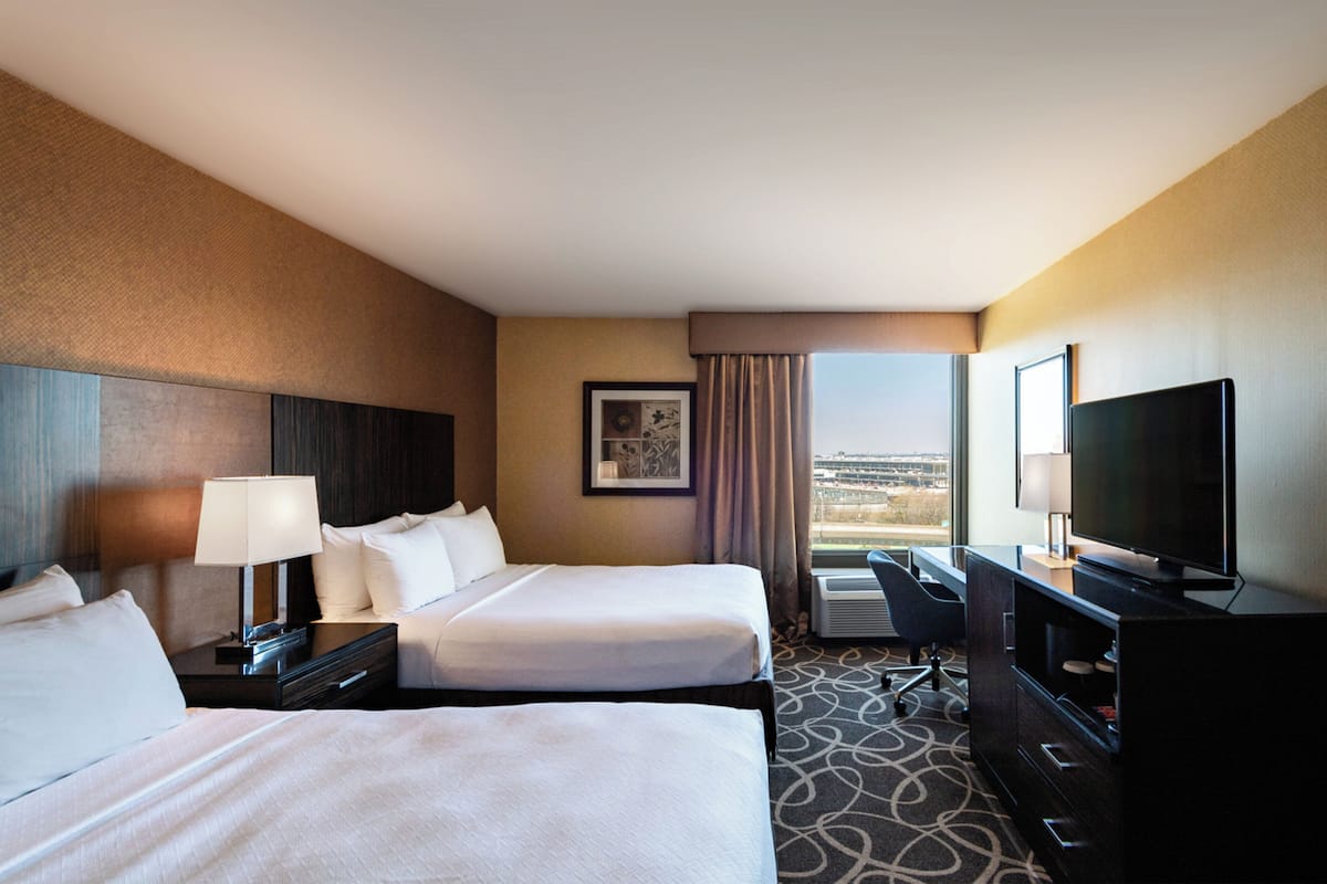 Premium bedding, desk, blackout drapes, soundproofing