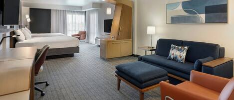 Studio, Multiple Beds | Living area | 32-inch Smart TV with satellite channels, TV, Netflix