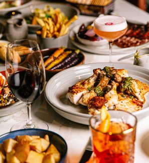 2 restaurants, breakfast, lunch, dinner served; local cuisine 