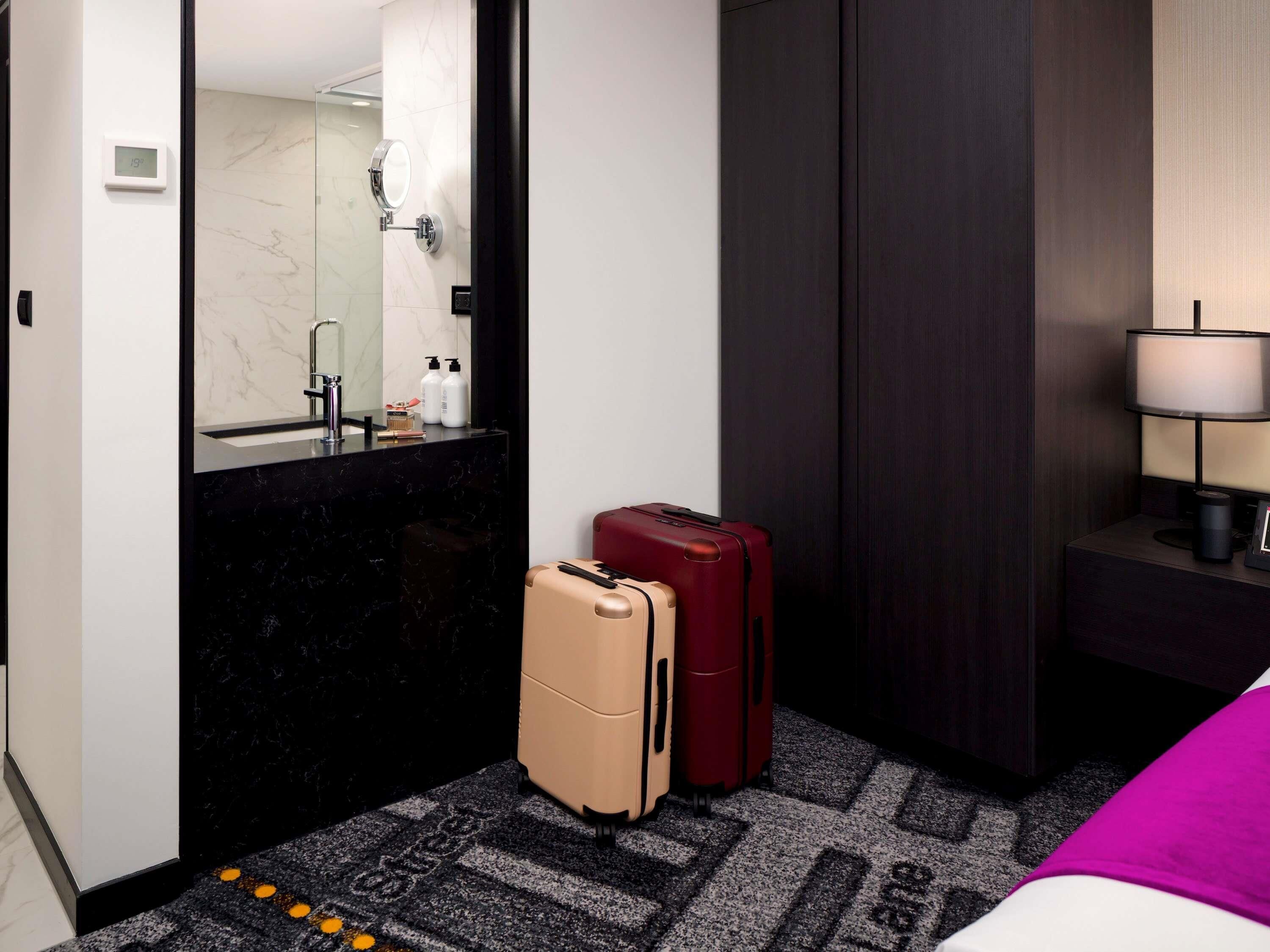 Classic Room, 1 Queen Bed | Minibar, in-room safe, blackout drapes, soundproofing