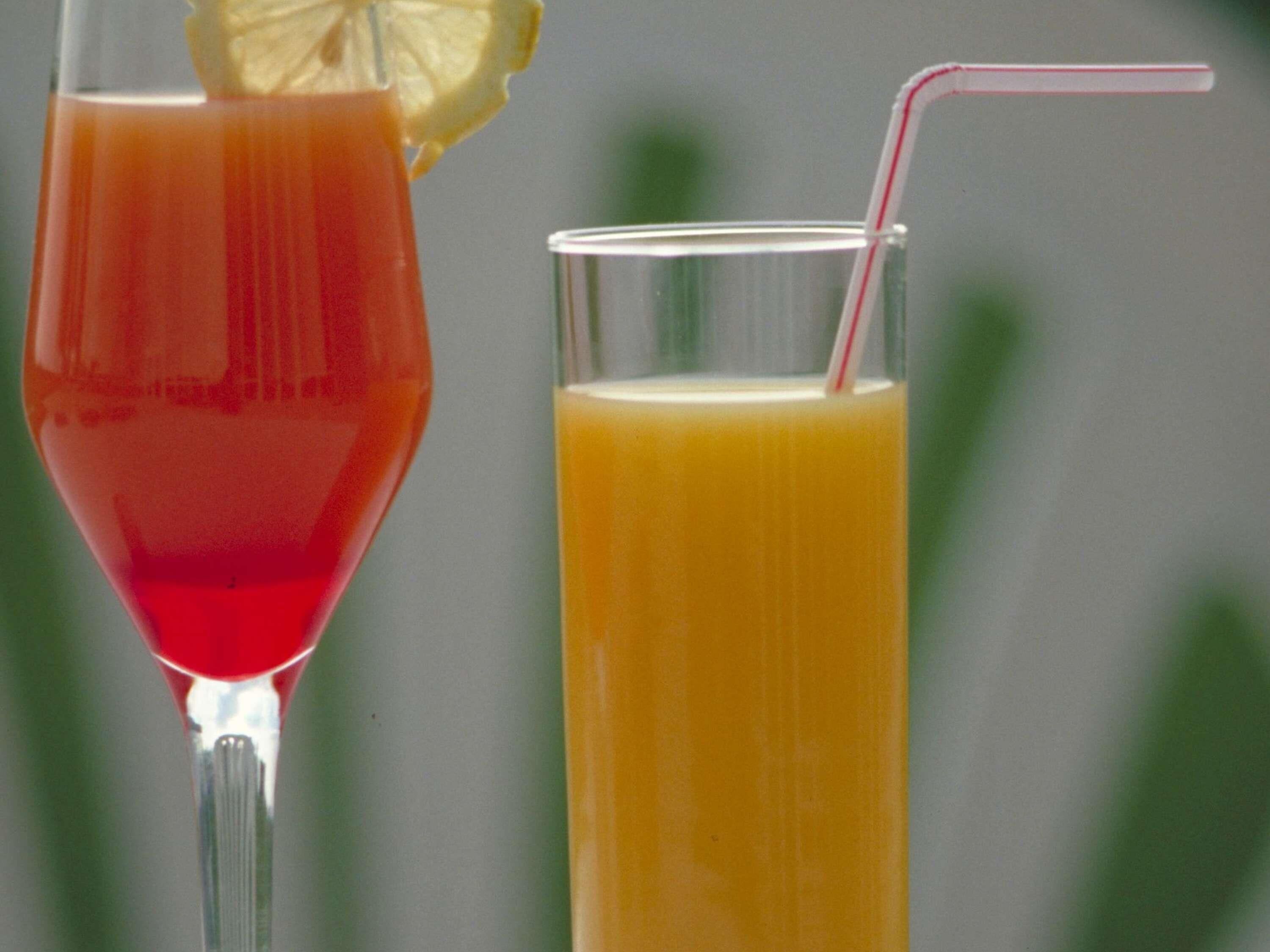 Two drinks in different glasses.