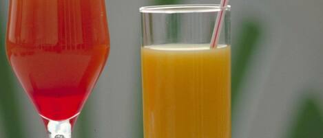 Two drinks in different glasses.
