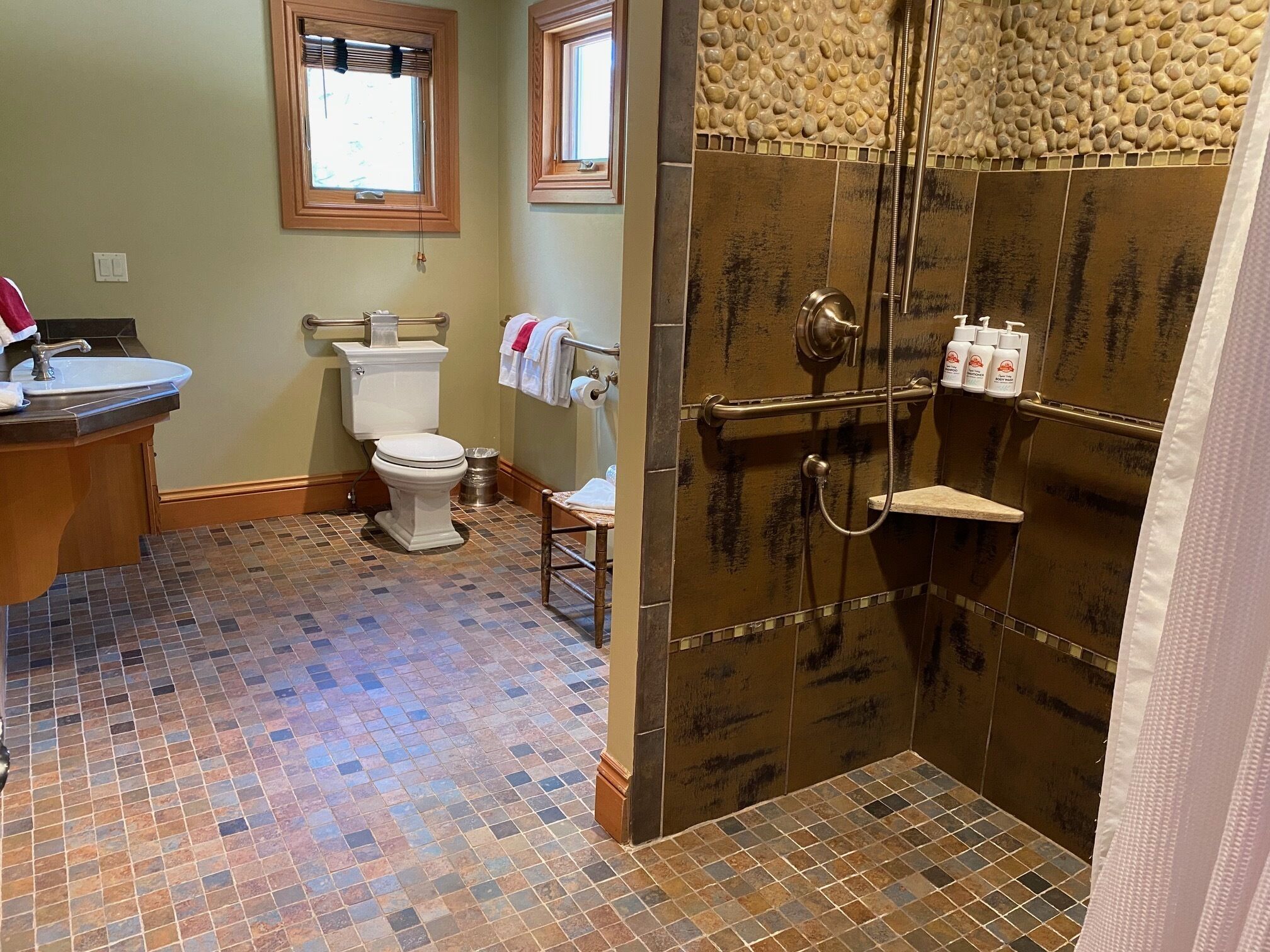 superior chalet | bathroom | combined shower/bathtub, hair dryer, towels, soap