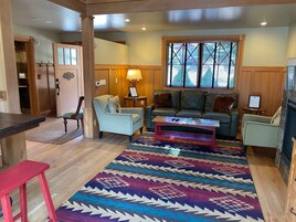 Superior Chalet | Living area | TV, books