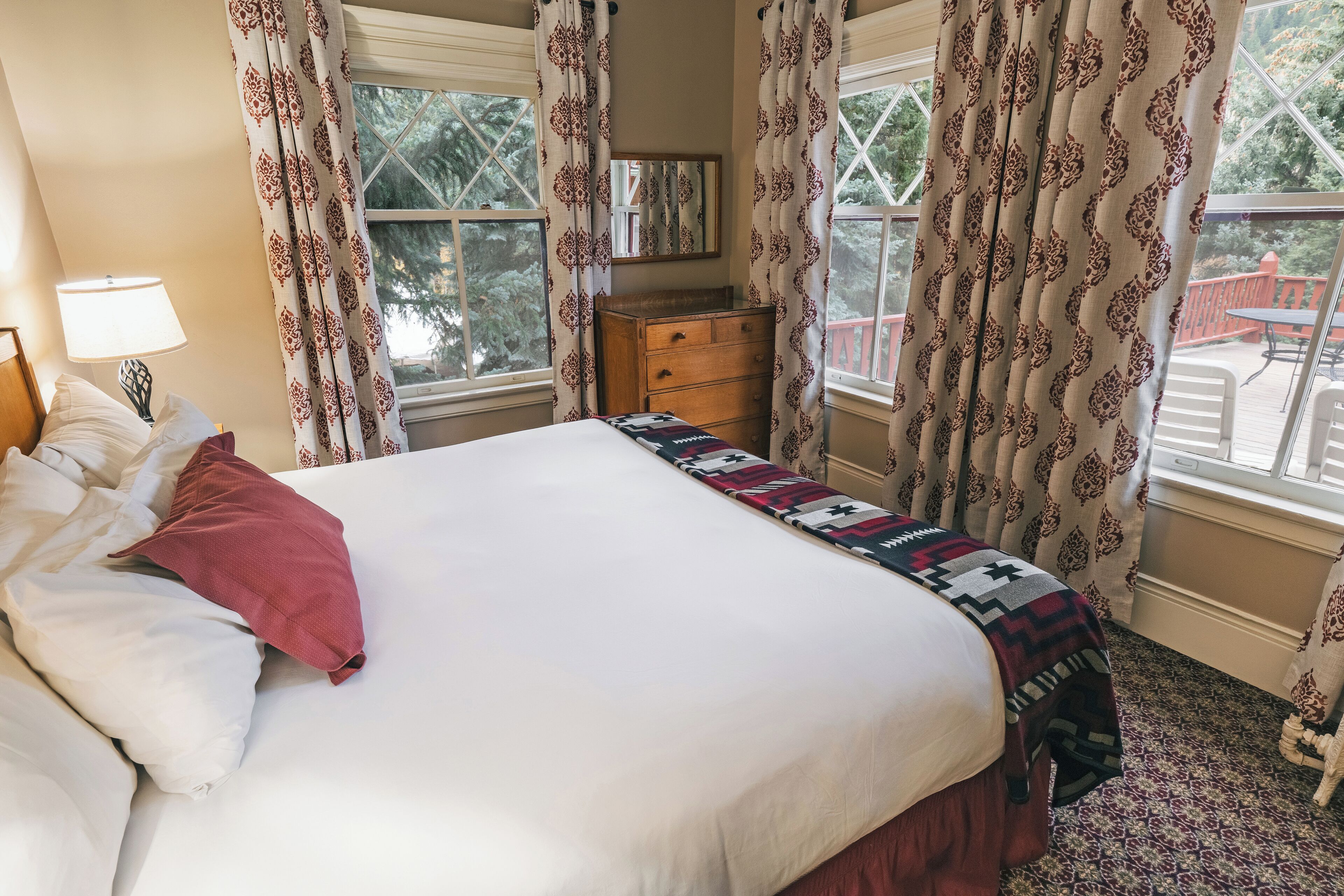 deluxe suite, 1 king bed, mountain view | 1 bedroom, premium bedding, down duvets, iron/ironing board