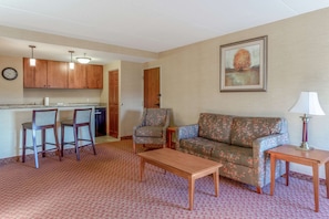 Suite, 1 King Bed, Non Smoking | Living area | 40-inch LCD TV with cable channels, TV