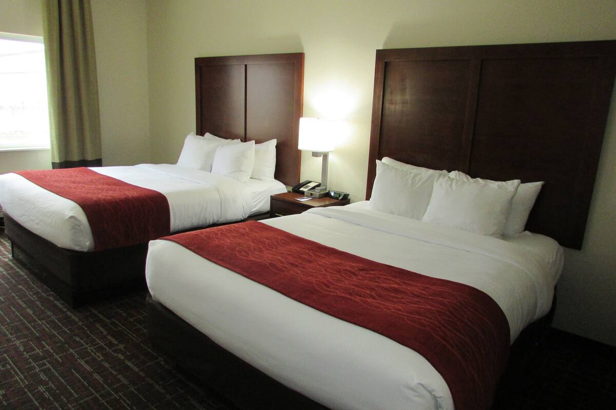 premium bedding, desk, laptop workspace, blackout curtains