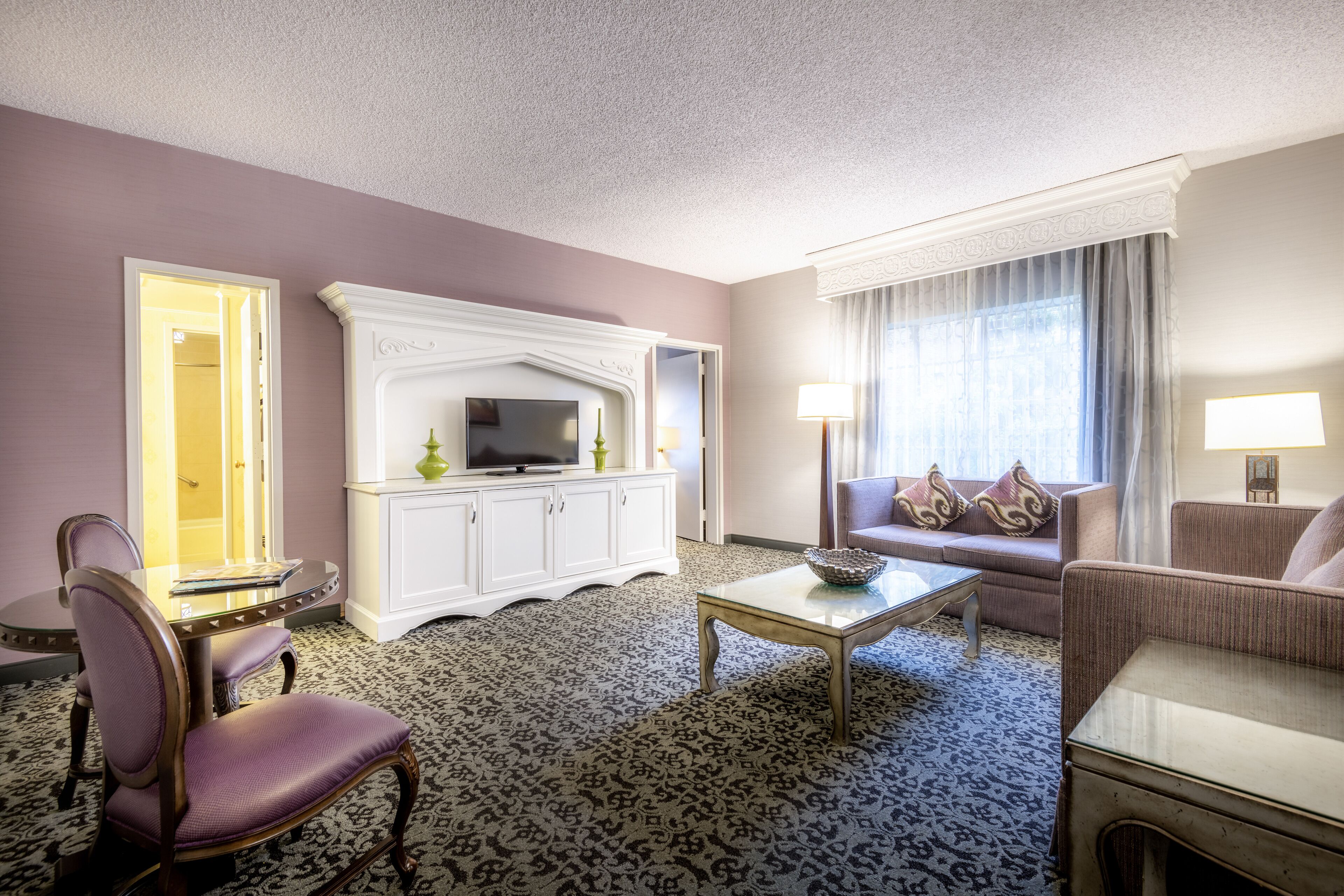 castle turret suite king bed with sofa sleeper | living area | 37-inch lcd tv with cable channels, tv