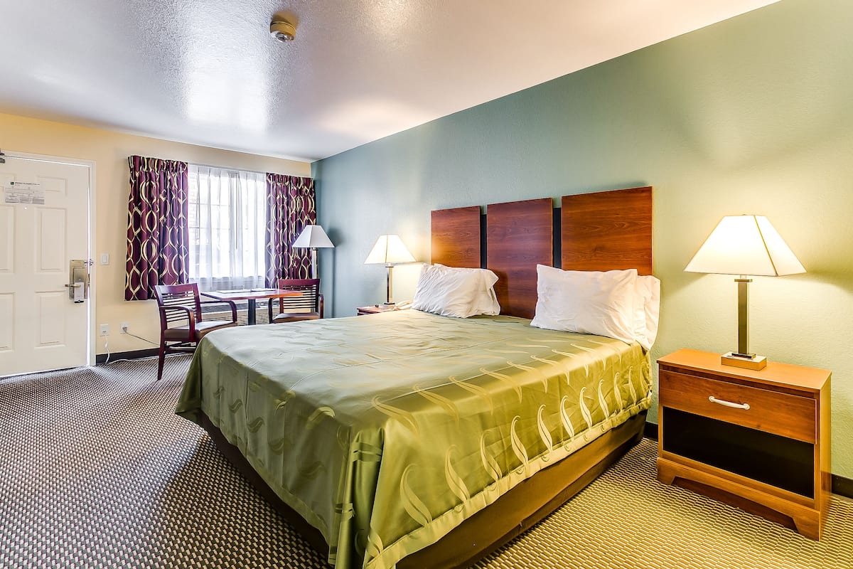 Down comforters, desk, blackout drapes, iron/ironing board