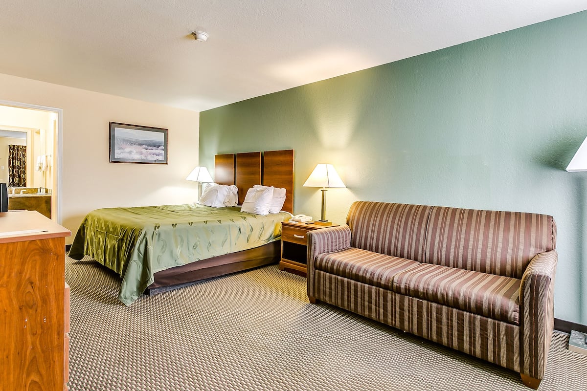 Down comforters, desk, blackout drapes, iron/ironing board