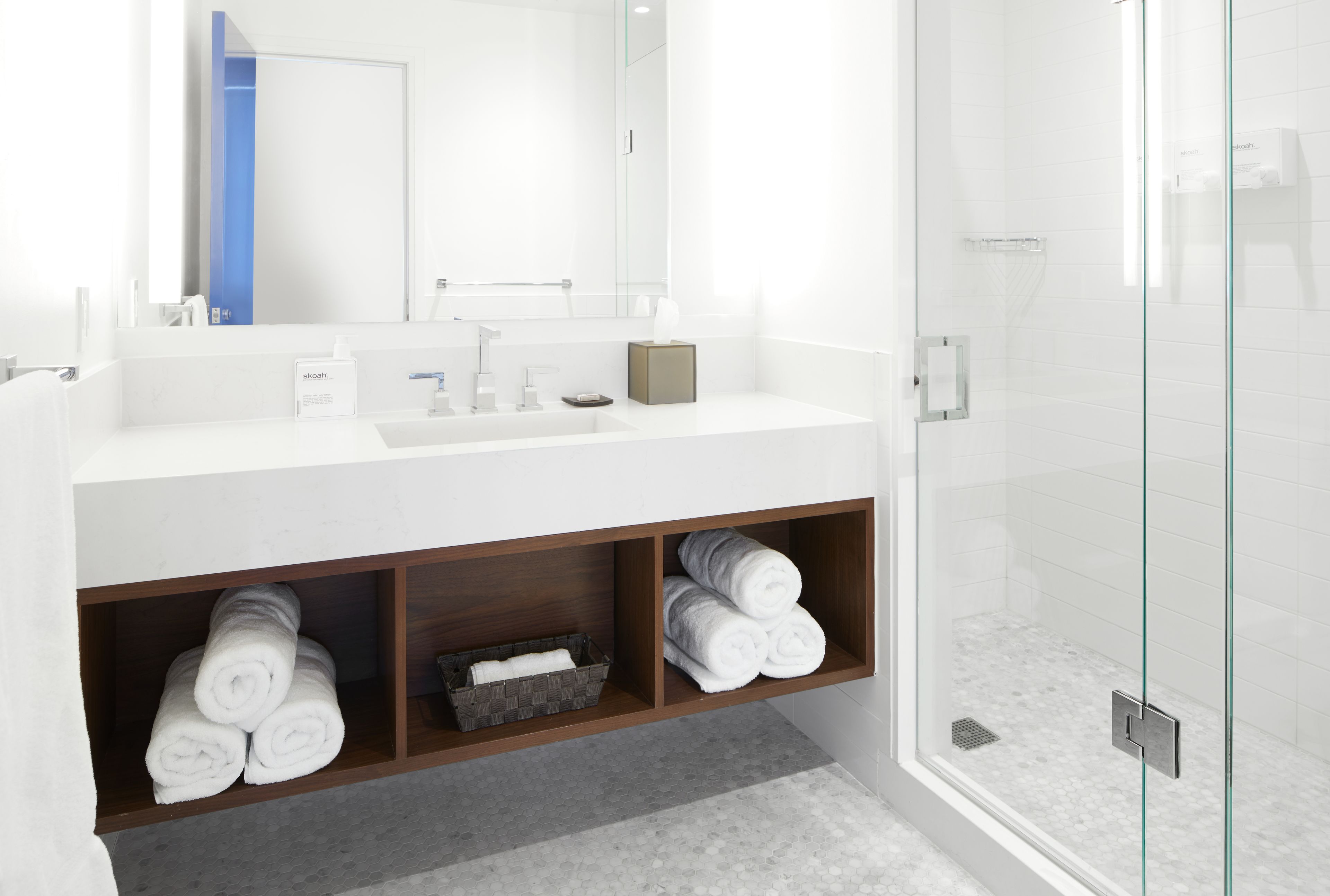 rainfall showerhead, designer toiletries, hair dryer, bathrobes