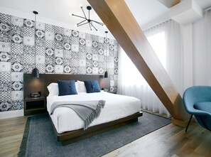 Premium bedding, down comforters, pillowtop beds, in-room safe