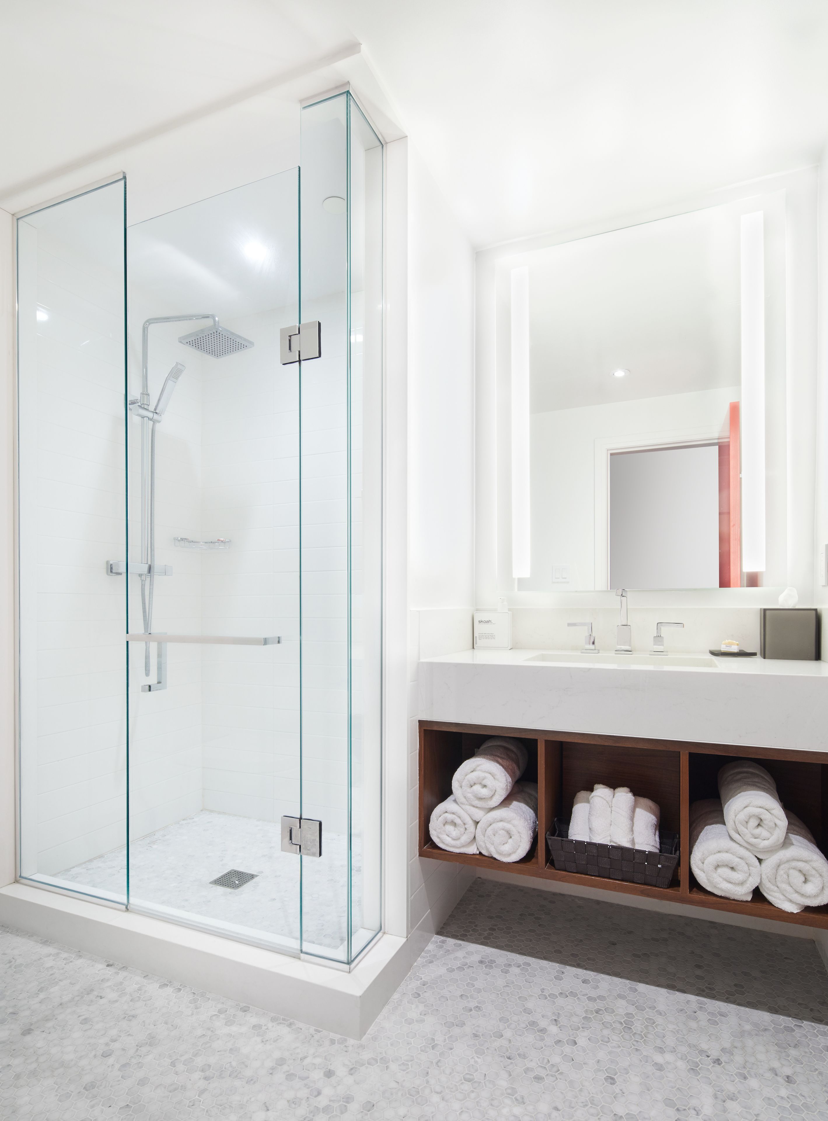 rainfall showerhead, designer toiletries, hair dryer, bathrobes