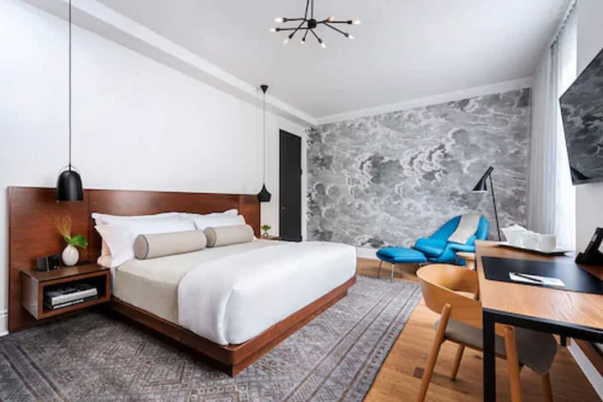 Premium bedding, down comforters, pillowtop beds, in-room safe