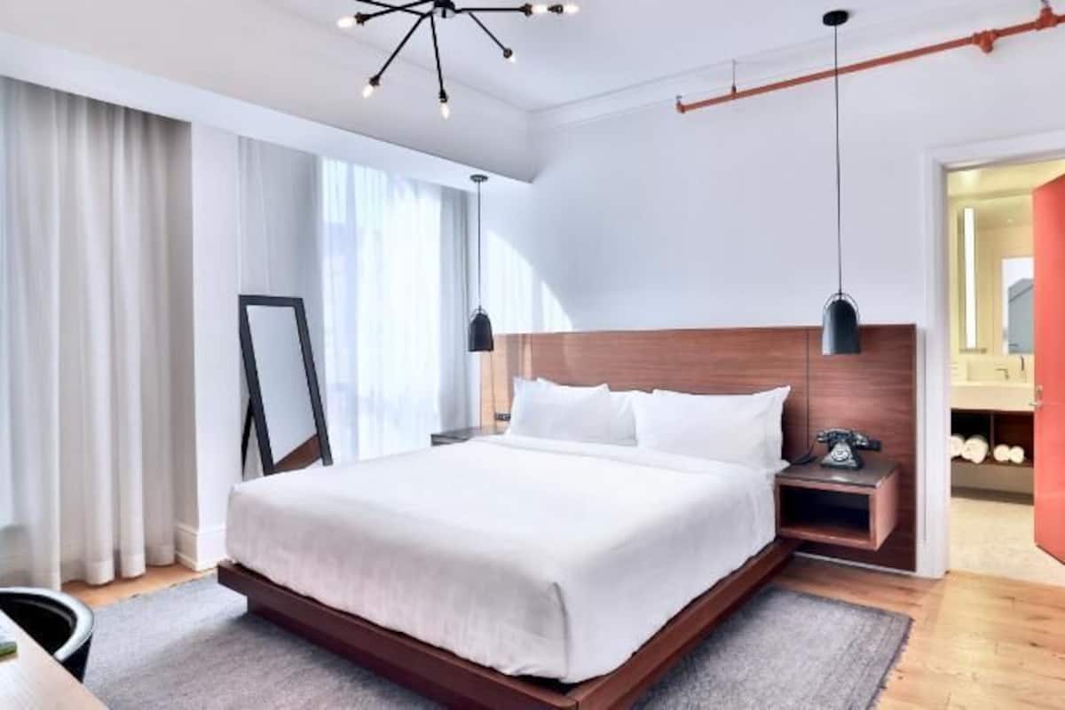Premium bedding, down comforters, pillowtop beds, in-room safe