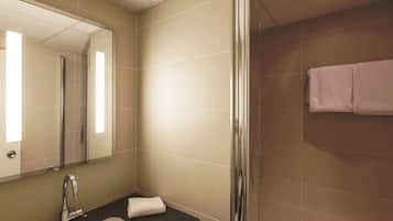Eco-friendly toiletries, hair dryer, towels