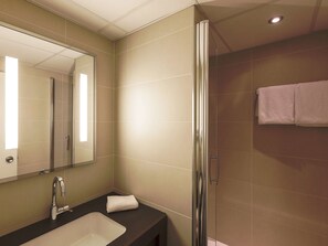 Eco-friendly toiletries, hair dryer, towels