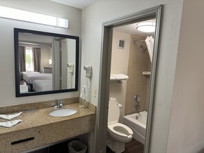 Standard Room, 2 Queen Beds | Bathroom | Combined shower/tub, free toiletries, hair dryer, towels