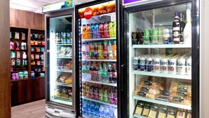 A vending machine with various drinks and snacks.