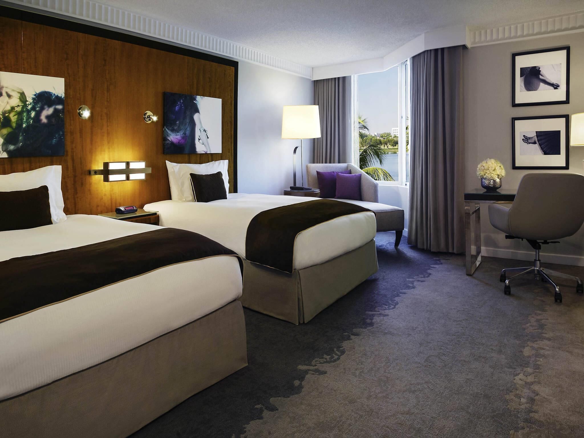Premium bedding, pillow-top beds, in-room safe, desk