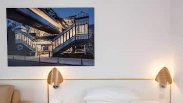 Hypo-allergenic bedding, desk, laptop workspace, blackout curtains