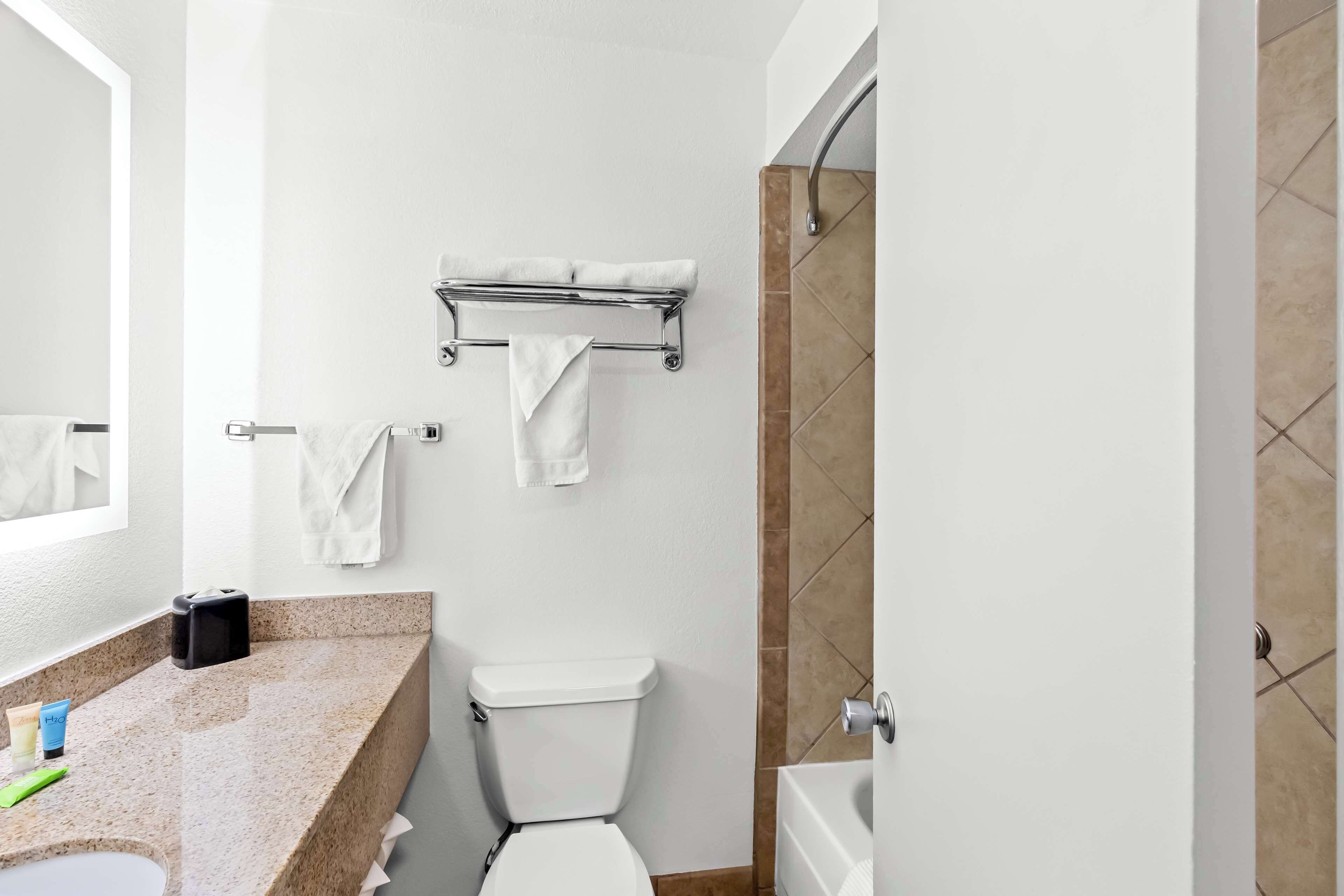 standard room, 2 queen beds | bathroom | combined shower/bathtub, eco-friendly toiletries, hair dryer, towels