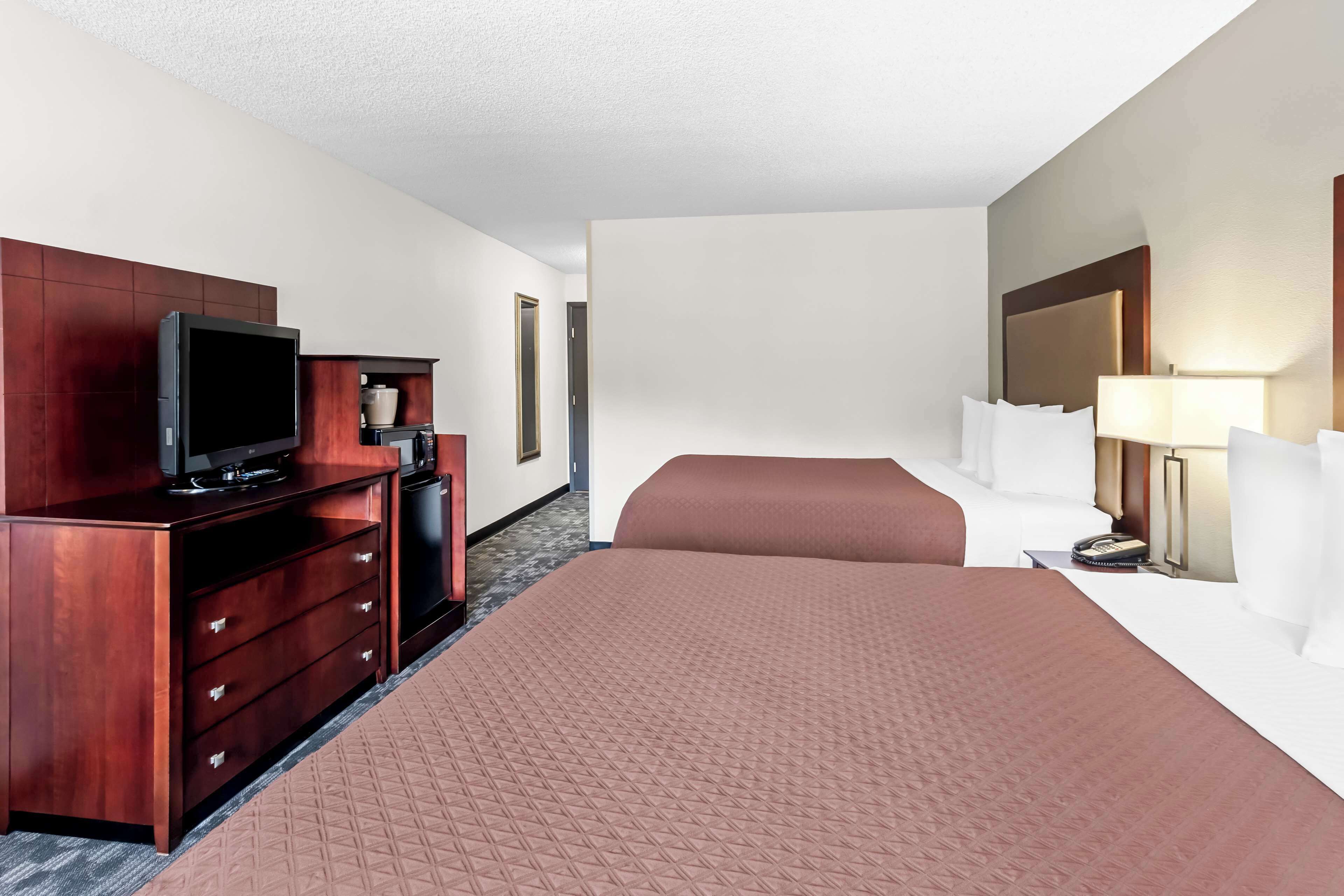 standard room, 2 queen beds | premium bedding, pillow-top beds, in-room safe, desk