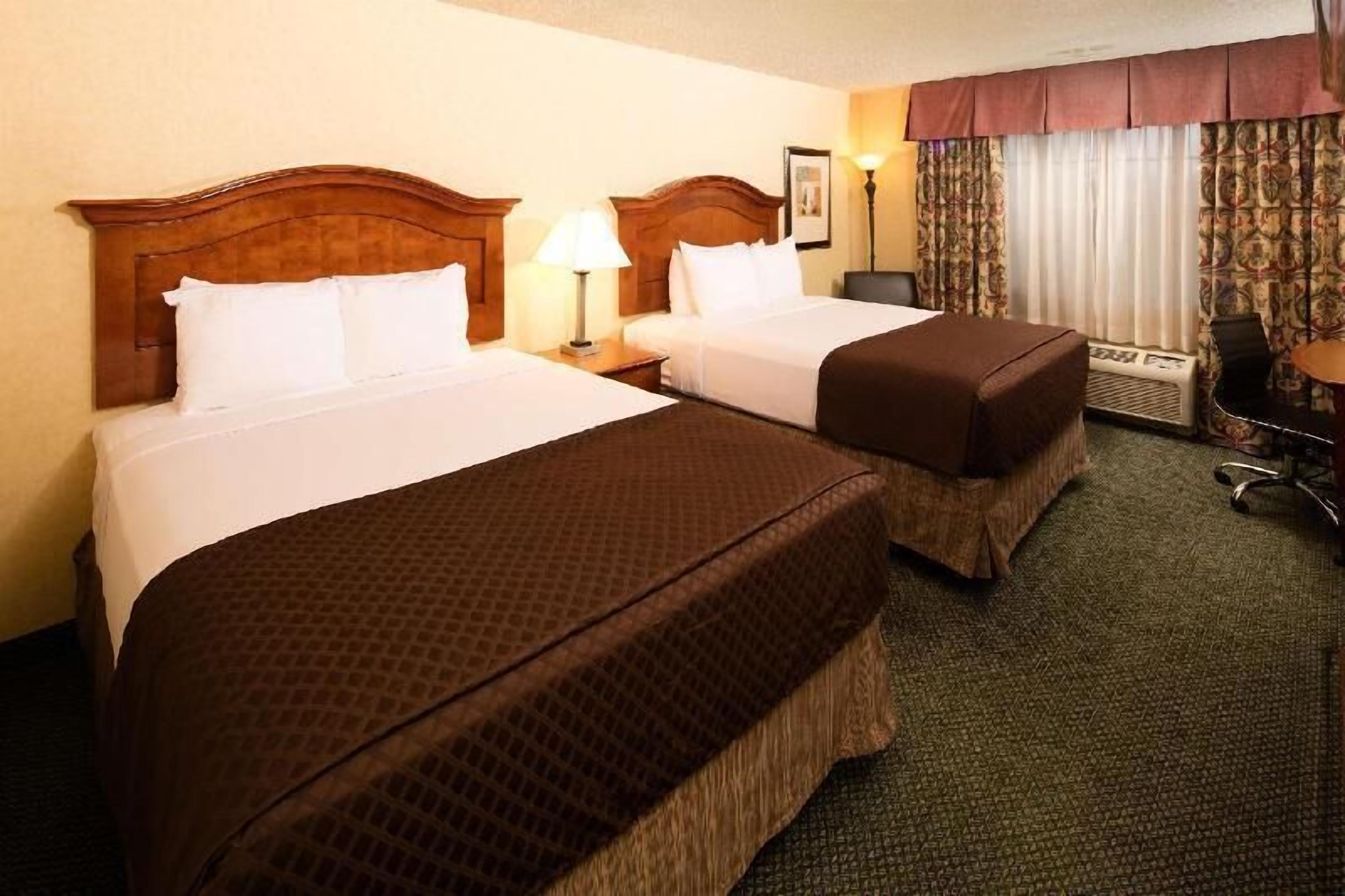 Premium bedding, pillow-top beds, in-room safe, desk