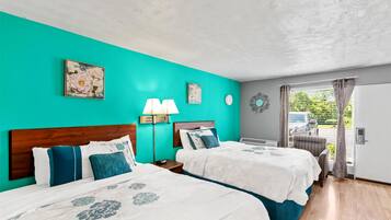 Desk, laptop workspace, blackout drapes, iron/ironing board