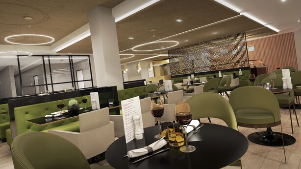 Un restaurante moderno con asientos tapizados en verde, mesas negras y un atril para el menú.