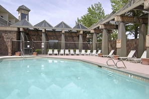 Seasonal outdoor pool, pool loungers