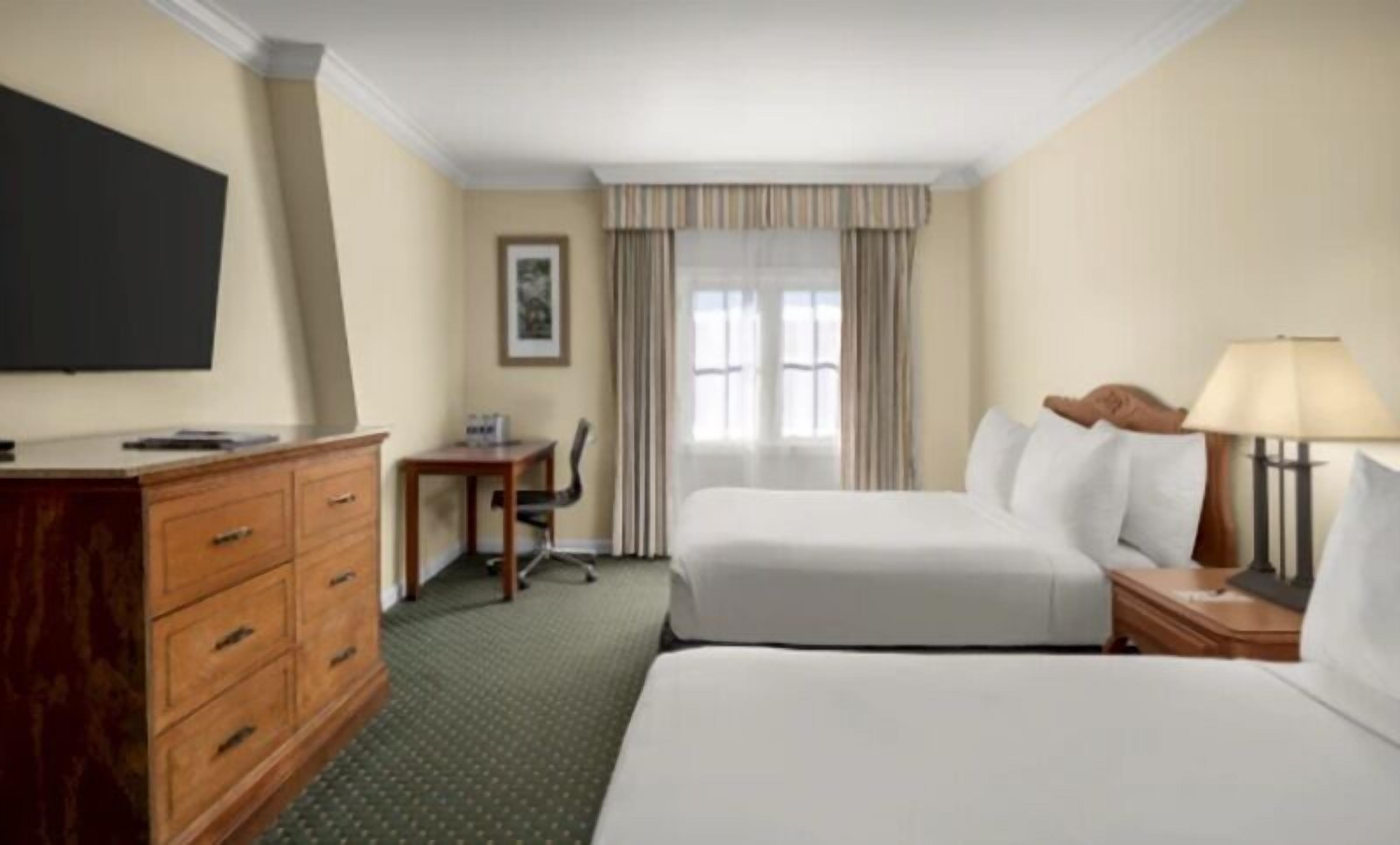 Premium bedding, down comforters, pillowtop beds, minibar