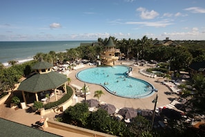 Outdoor pool, pool umbrellas, sun loungers