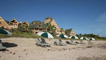 Private beach, white sand, sun loungers, beach umbrellas