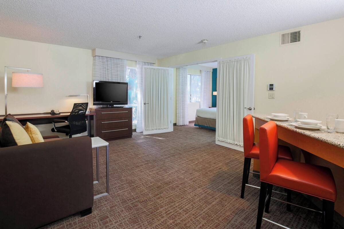 Suite, 1 Bedroom | In-room safe, blackout drapes, iron/ironing board, cribs (free)