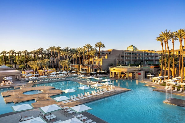 10 outdoor pools, open 6:00 AM to 11:00 PM, pool cabanas (surcharge)