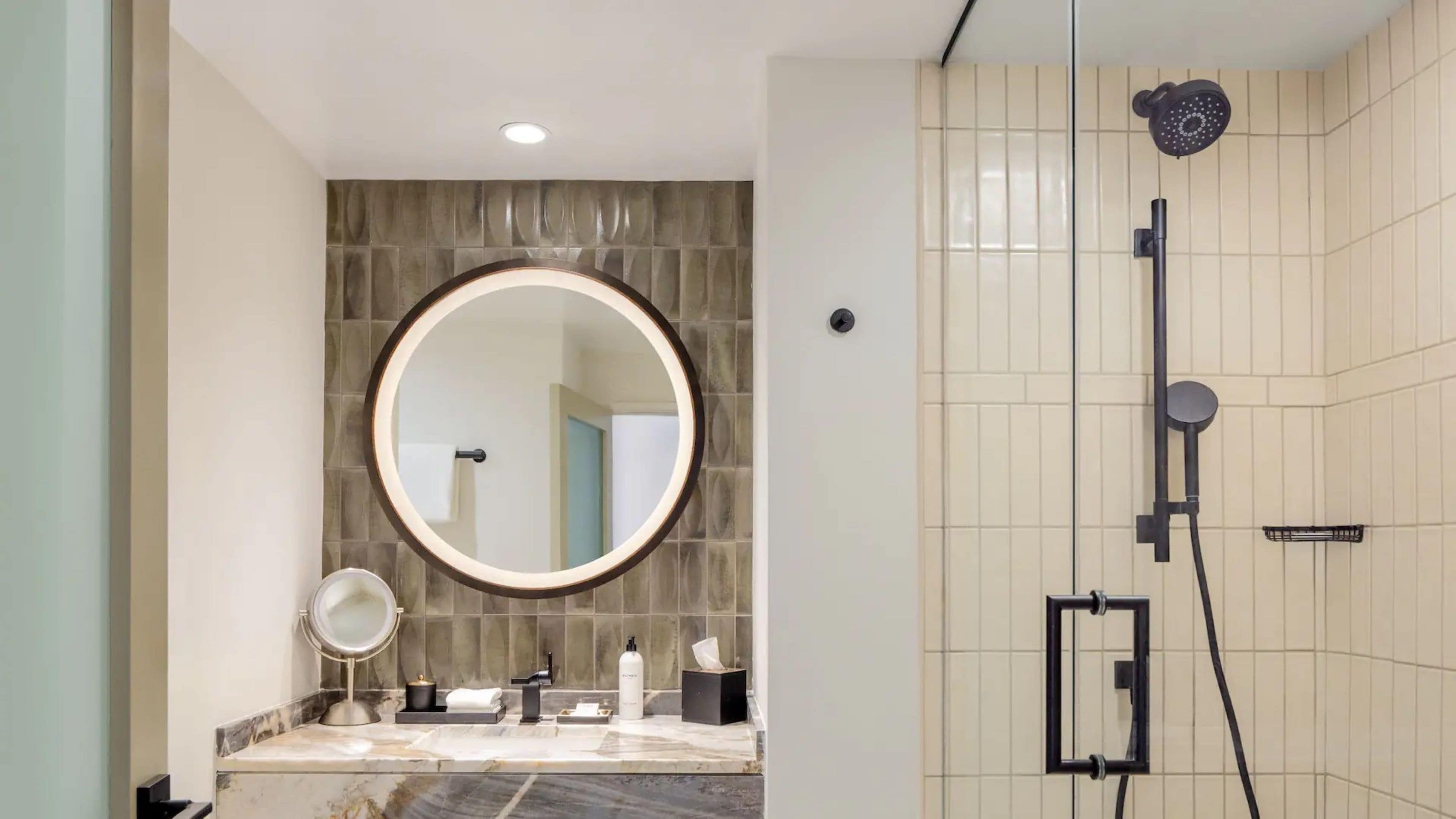 designer toiletries, hair dryer, bathrobes, towels