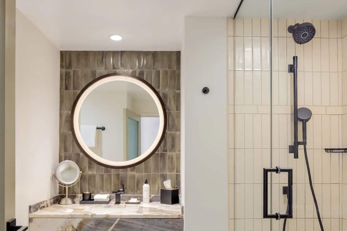 designer toiletries, hair dryer, bathrobes, towels
