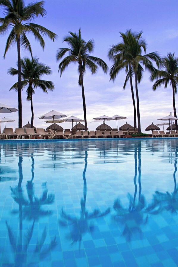 2 outdoor pools, pool umbrellas, pool loungers