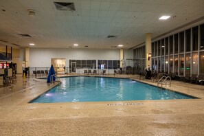 Indoor pool, open 9:30 AM to 11:00 PM, pool loungers