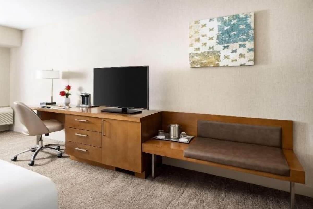 Premium bedding, down duvets, pillow-top beds, in-room safe