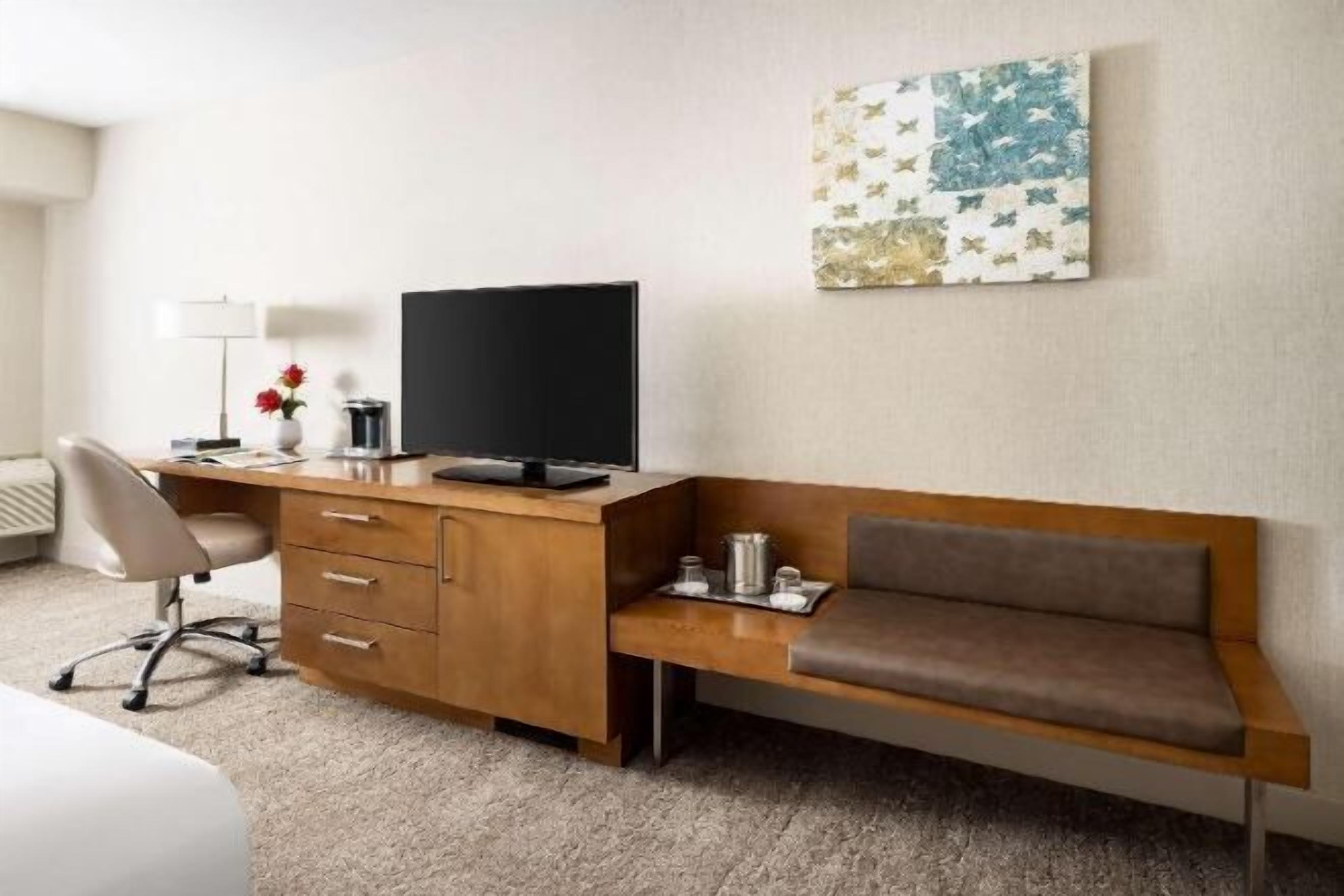 Premium bedding, down comforters, pillowtop beds, in-room safe
