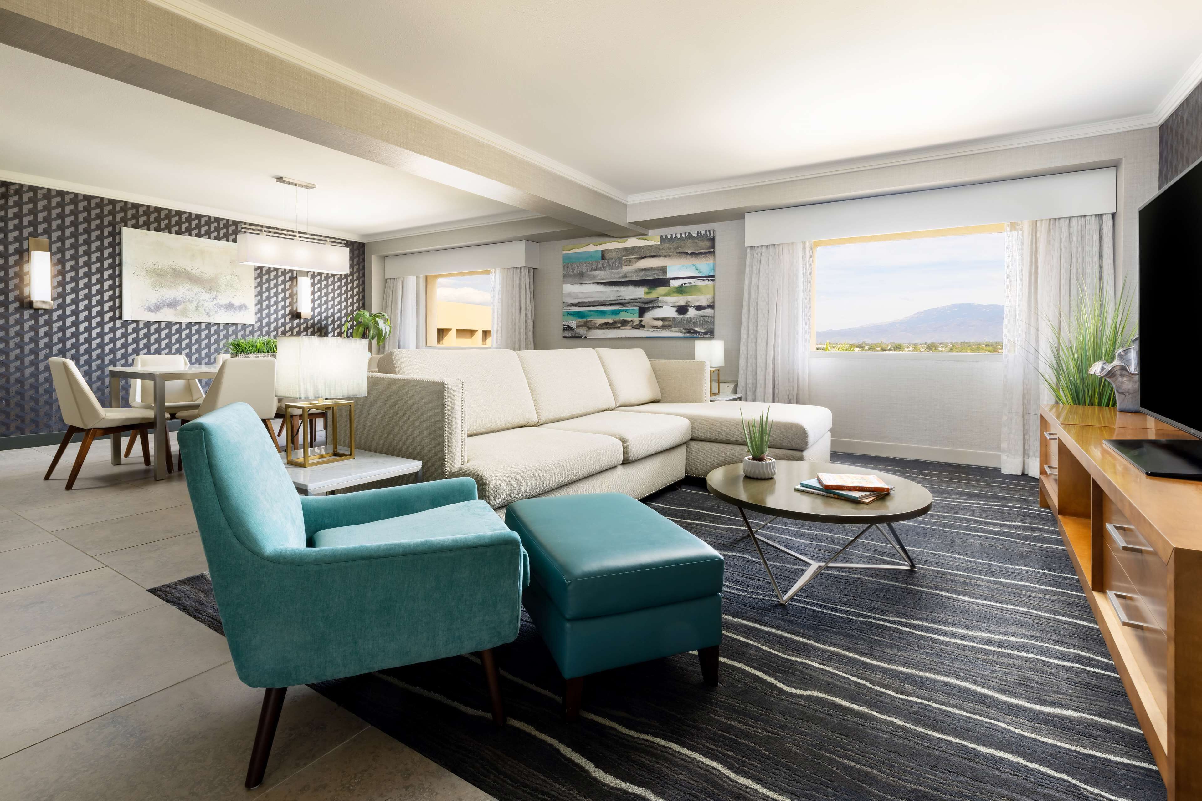 1 king 1 bedroom executive suite | living area | 43-inch led tv with cable channels, tv, mp3 dock