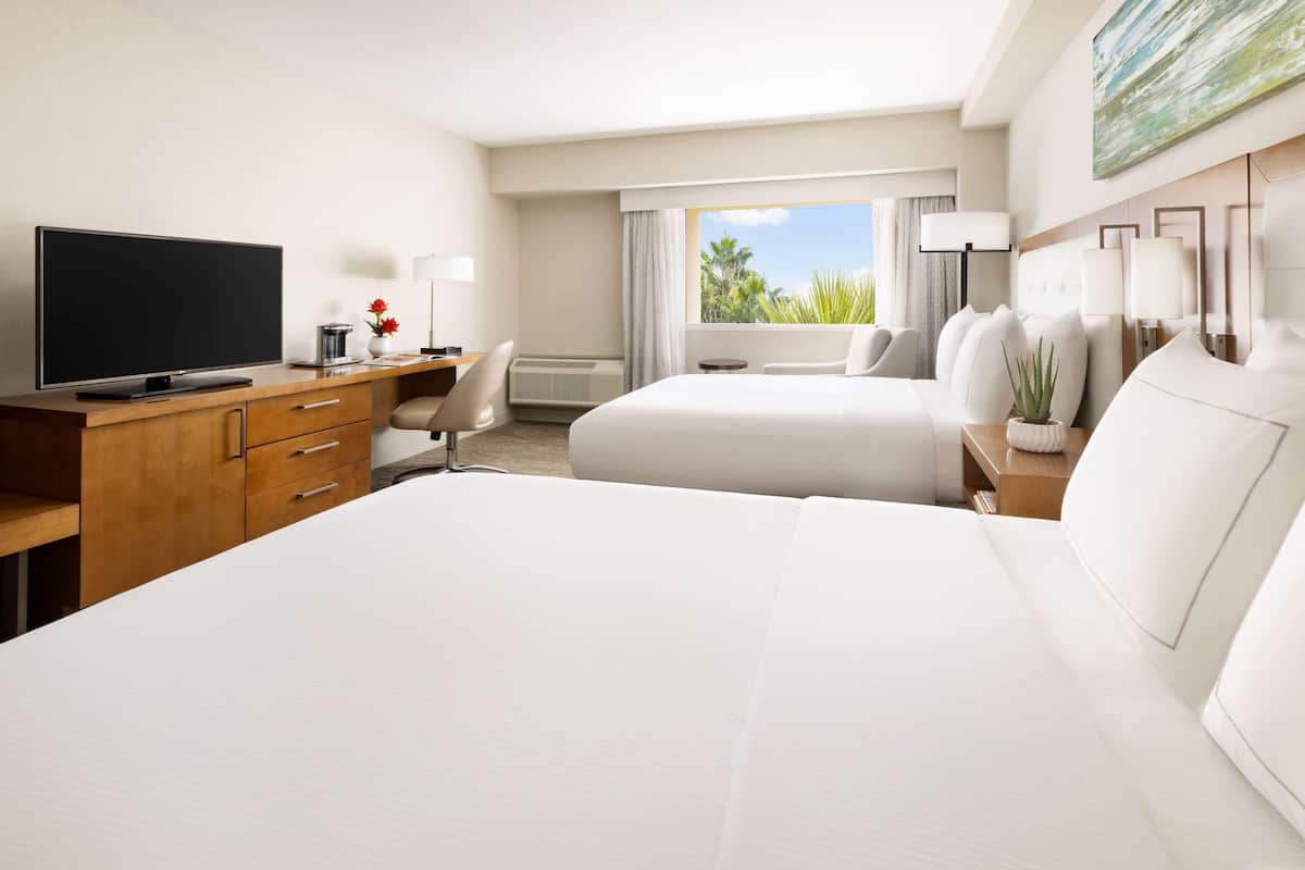 premium bedding, down duvets, pillow-top beds, in-room safe