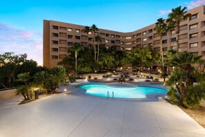 Outdoor pool, open 6 AM to 10:00 PM, pool umbrellas, sun loungers